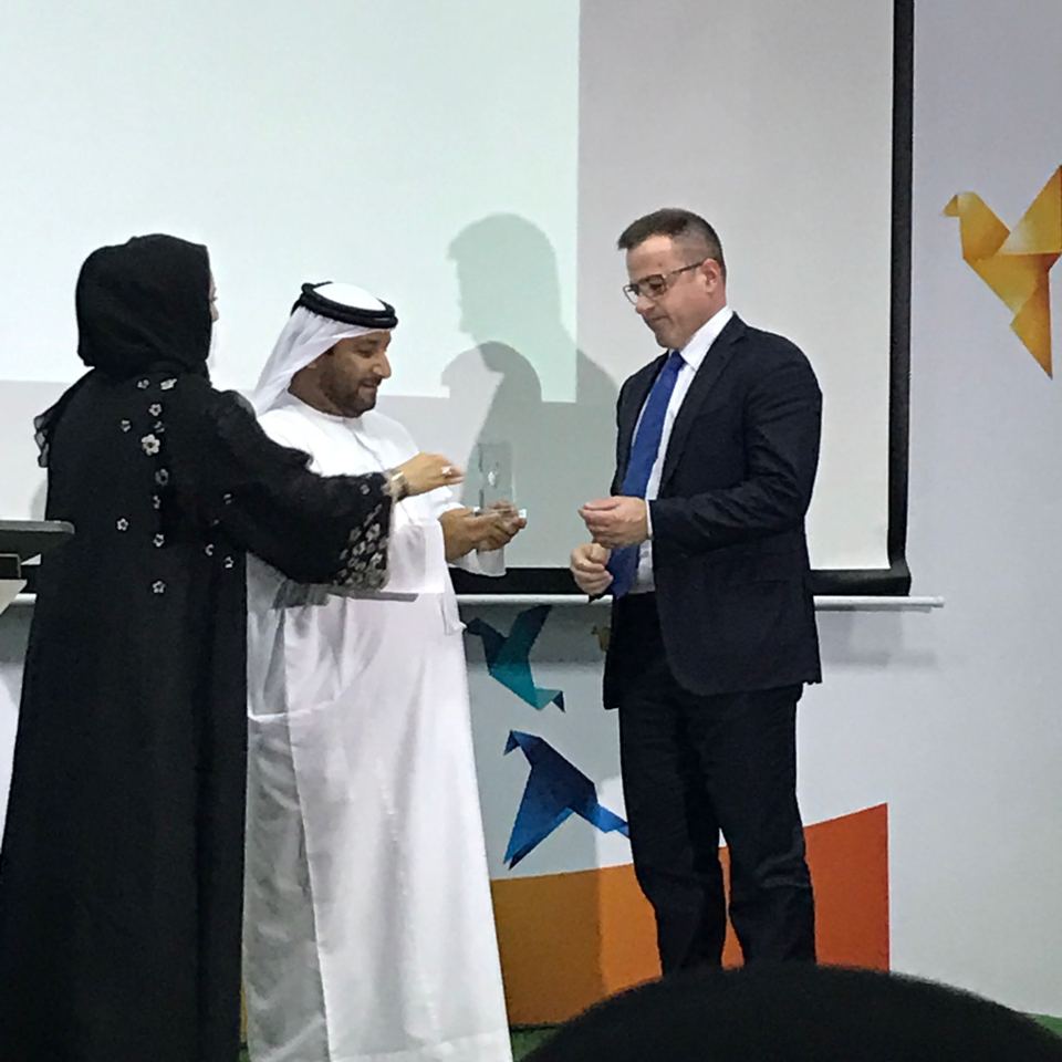Chris Velis receiving recognition at UAE Innovation Week as keynote speaker for the Dubai government and Ministry of Health