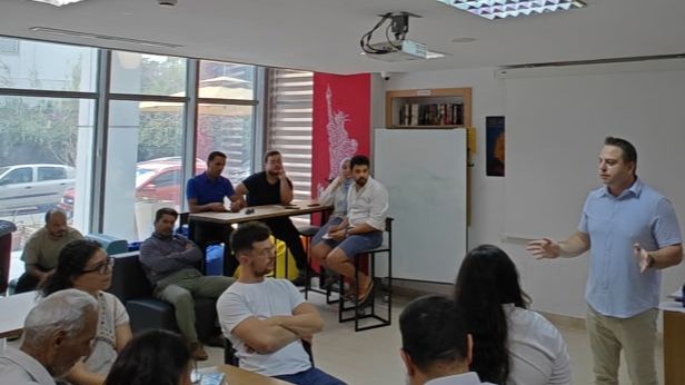 Dr. Christos Kelepouris teaching executive education at the U.S. Embassy in Tunisia